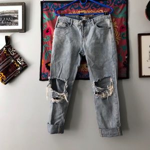 Relaxed fit light wash distressed jeans